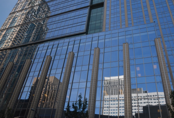 reflection of buildings on glass building,downtown Seattle